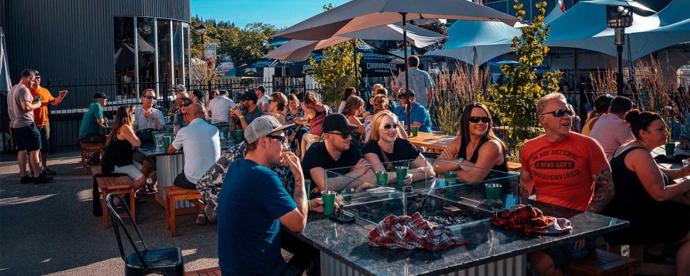 Customers at a restaurant outdoor patio in Prince George.