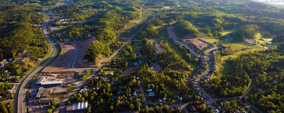 Aerial photograph of Prince George taken in a residential area with many trees.