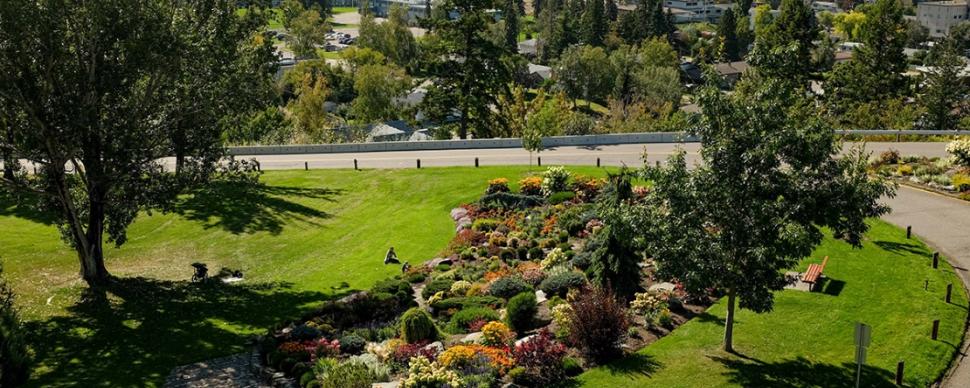 An aerial view of Connaught Hill Park, with walkers enjoying the flower beds. 
