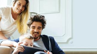 parents watching child play video games